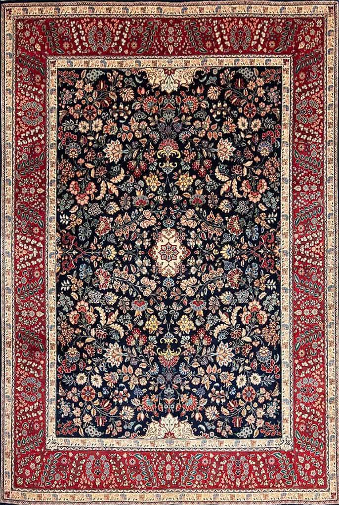 A luxurious room-size Persian Tabriz wool rug from Beautiful Rugs Chicago — hand-knotted excellence and refined artistry at an attainable price under $10000.
