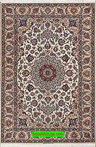 High quality Persian Isfahan vegetable dyed kork wool and silk rug in beige color. Size 4.9x7.3. High quality Persian Isfahan vegetable dyed kork wool and silk rug in beige color. Size 4.9x7.3.