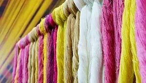 Samples of silk fiber in white and brown colors in the baskets. Samples of silk fiber in white and brown colors in the baskets.