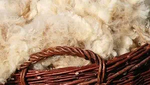 Large basket loaded with wool.
