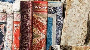 Rolled silk rugs and wool rugs in a variety of colors and styles Rolled silk rugs and wool rugs in a variety of colors and styles