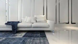 Modern style living room with white sofa and dark color rug Modern style living room with white sofa and dark color rug