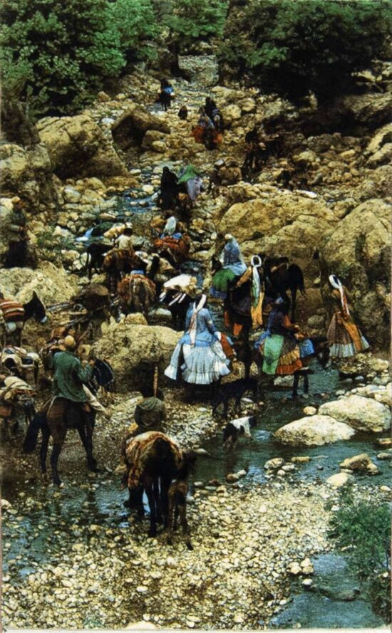 5411- Persian Tabriz wall hanging rug depicting Kooche Ashayer, a hand-carved tribal migration scene woven in fine wool on silk foundation, approximately 3.4 × 5.2 feet.