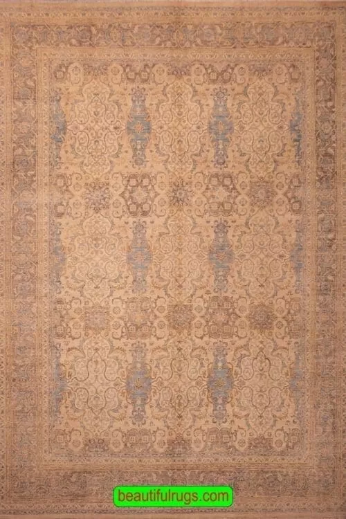 Hand woven oriental wool rug with beige and turquoise colors. Size 8.9x11.10.
