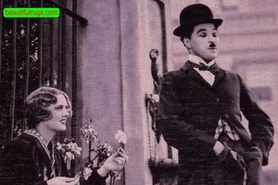 Handmade Persian Tabriz portrait of Charlie Chaplin and Virginia Cherrill, a scene of City Lights movie. Size 2.4x3