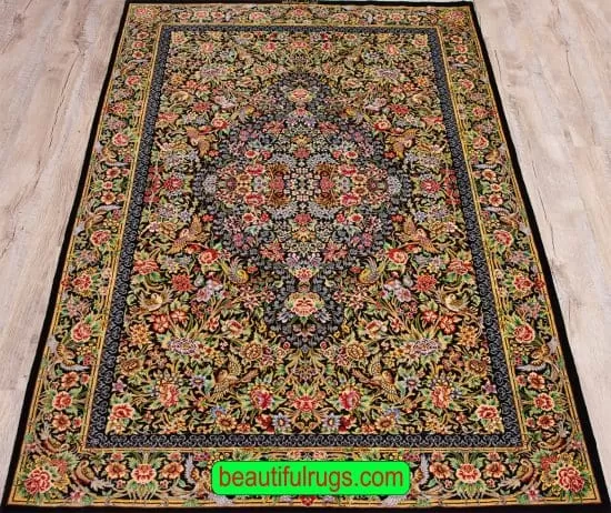 Pure silk Persian Qum rug with black and green colors. Size 3.5x5