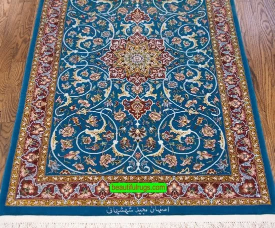 Handmade Persian Isfahan kork wool and silk rug in blue color. Size 3x4.5.