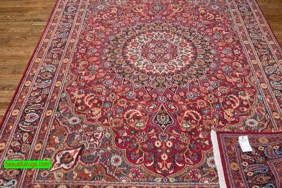 Hand knotted Persian Mood area rug in red color. Size 6.6x9.9.