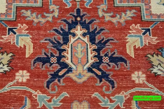 Handmade Persian Heriz wool rug in orange red color. Size 6.6x10.