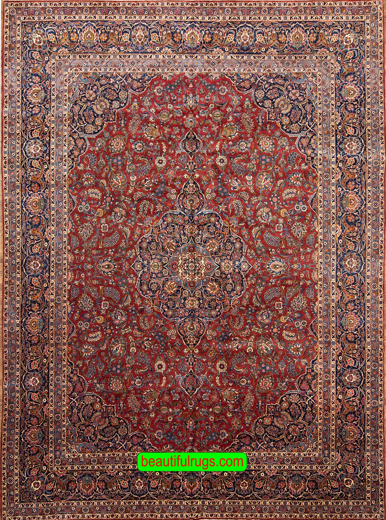 Semi antique Persian Kashan rug with orange red and navy blue color. Size 11.3x14.7.
