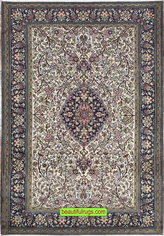 Hand knotted floral Persian Qum wool and silk rug in beige and navy blue color. Size 4.8x7.1.