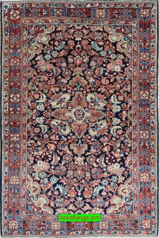 Vintage Persian Mahal wool rug with blue and red colors, floral design. Size 4.5x6.9.