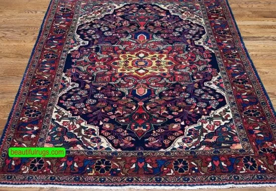 Handmade Persian tribal Borchalo rug in navy blue color and geometric floral style. Size 5.1x6.8.