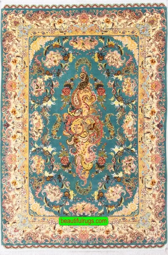 Handmade Persian Tabriz rug, unique floral design with teal green and rose colors. Size 5.2x7.4.