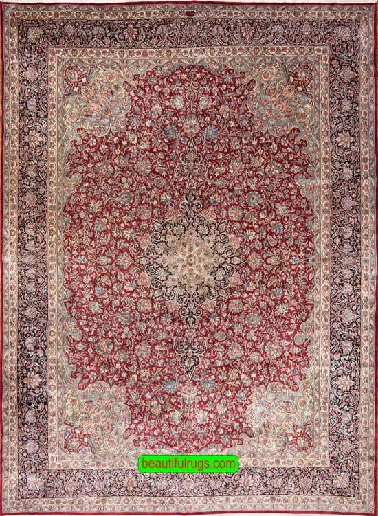 Beautiful hand knotted Persian Kerman wool rug in red and navy blue colors. Size 11.4x15.4.