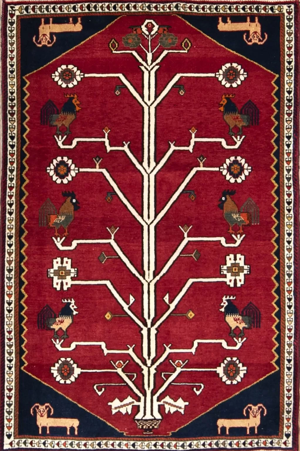 Red Persian rug. A handmade tribal style tree of life rug with goats and roosters in red color. Size 3.8x5.5.